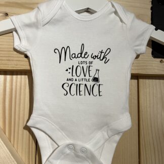 Romper made with lots of love and a little science
